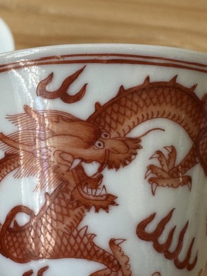 Lot 78 - A PAIR OF IRON-RED 'DRAGON' CUPS, TONGZHI MARKS AND OF THE PERIOD (1862-74)