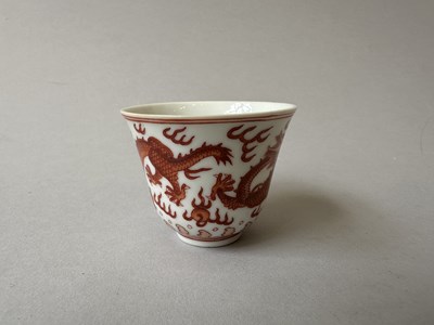 Lot 78 - A PAIR OF IRON-RED 'DRAGON' CUPS, TONGZHI MARKS AND OF THE PERIOD (1862-74)