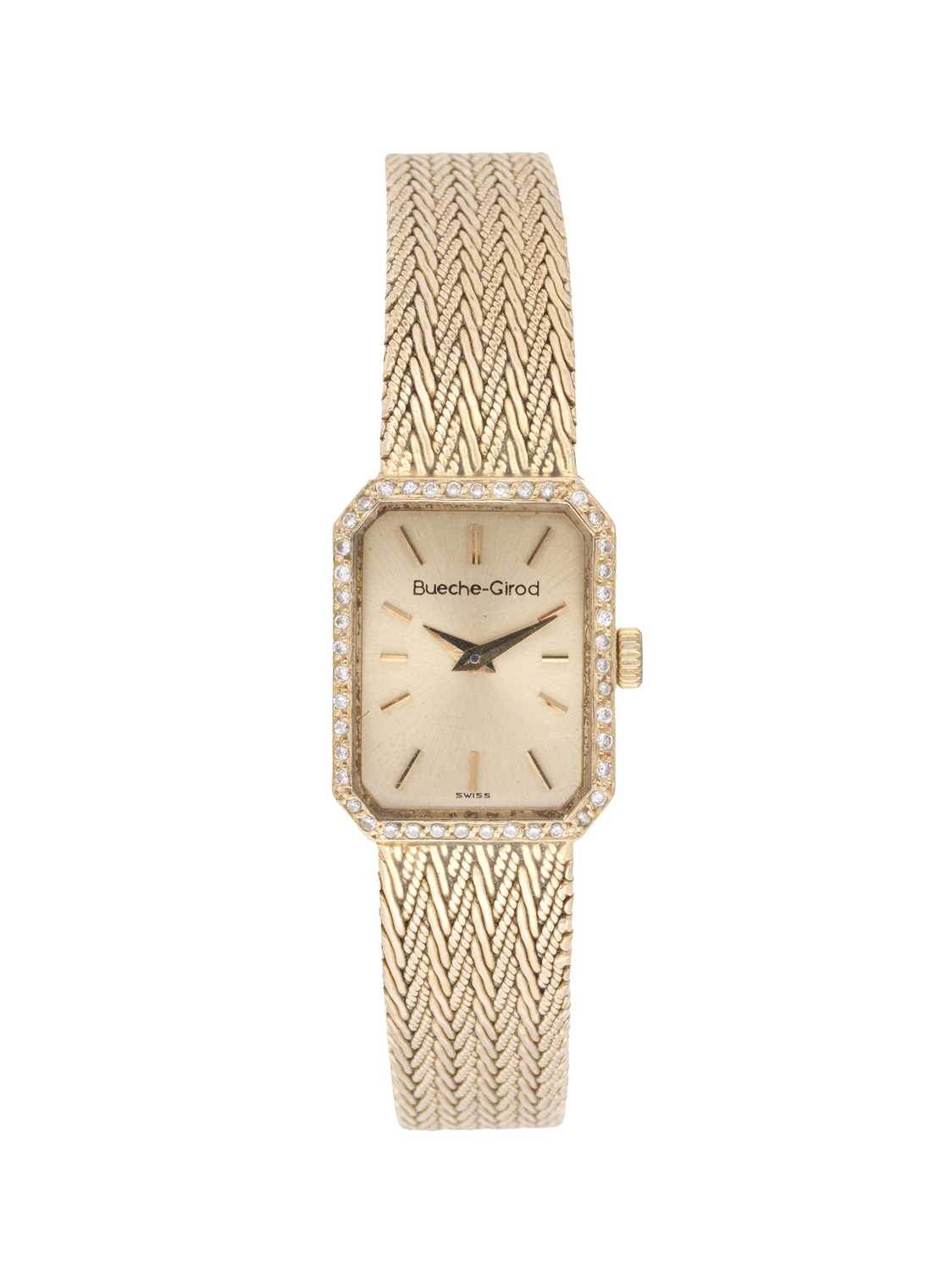 Lot 338 - BUECHE GIROD: LADY'S GOLD AND DIAMOND BRACELET WATCH, CIRCA 1987