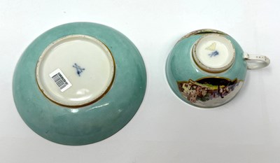 Lot 4 - A MEISSEN PORCELAIN TURQUOISE GROUND CUP AND SAUCER, MID 18TH CENTURY