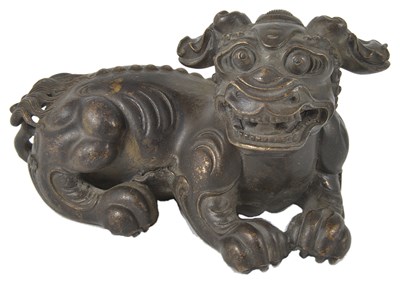 Lot 74 - A CHINESE BRONZE BUDDHIST LION SCROLL WEIGHT