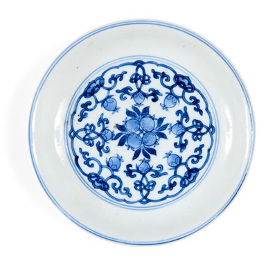 Lot 5 - A CHINESE BLUE AND WHITE PEACH AND POMEGRANATE SAUCER DISH, CHENGHUA MARK, KANGXI PERIOD (1662-1722)