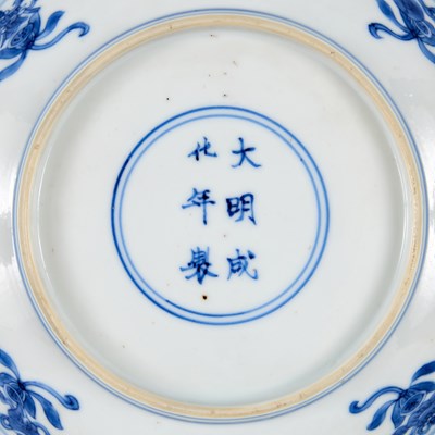 Lot 6 - A CHINESE BLUE AND WHITE PEACH AND POMEGRANATE SAUCER DISH, CHENGHUA MARK, KANGXI PERIOD (1662-1722)