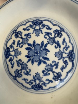 Lot 6 - A CHINESE BLUE AND WHITE PEACH AND POMEGRANATE SAUCER DISH, CHENGHUA MARK, KANGXI PERIOD (1662-1722)