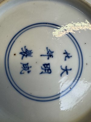 Lot 6 - A CHINESE BLUE AND WHITE PEACH AND POMEGRANATE SAUCER DISH, CHENGHUA MARK, KANGXI PERIOD (1662-1722)