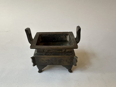 Lot 58 - A CHINESE ARCHAISTIC BRONZE CENSER, FANG DING