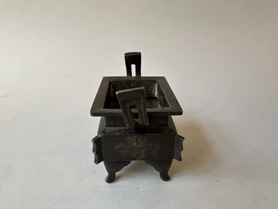Lot 58 - A CHINESE ARCHAISTIC BRONZE CENSER, FANG DING