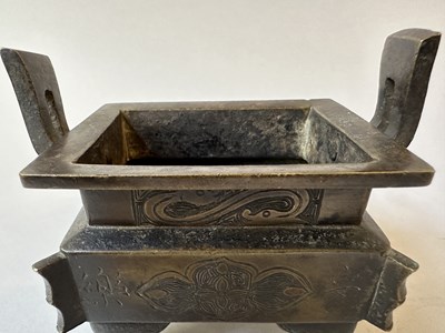 Lot 58 - A CHINESE ARCHAISTIC BRONZE CENSER, FANG DING