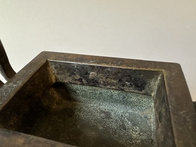 Lot 58 - A CHINESE ARCHAISTIC BRONZE CENSER, FANG DING