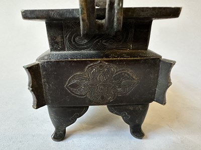 Lot 58 - A CHINESE ARCHAISTIC BRONZE CENSER, FANG DING