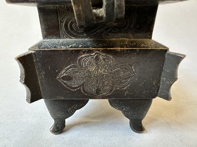 Lot 58 - A CHINESE ARCHAISTIC BRONZE CENSER, FANG DING