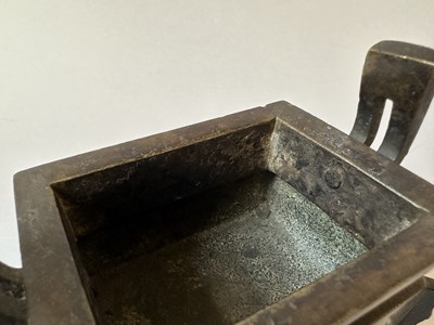 Lot 58 - A CHINESE ARCHAISTIC BRONZE CENSER, FANG DING