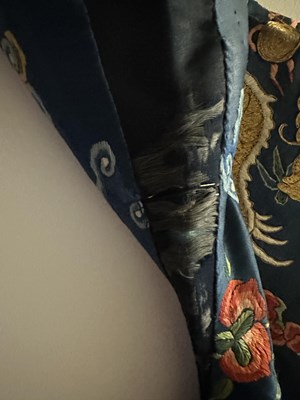 Lot 41 - A CHINESE NAVY-BLUE GROUND ROBE, LATE QING DYNASTY
