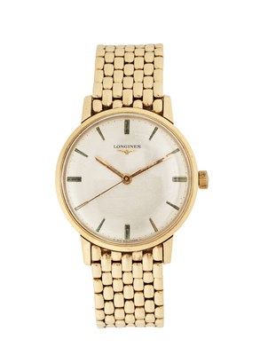 Lot 313 - LONGINES: GENTLEMAN'S GOLD BRACELET WATCH, CIRCA 1997