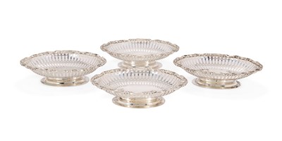 Lot 129 - A SET OF FOUR VICTORIAN SILVER SWEETMEAT DISHES, HENRY BRASTED, LONDON, 1899