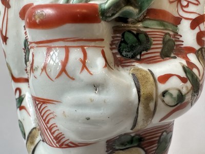 Lot 87 - A PAIR OF CHINESE FAMILLE-VERTE 'BOYS', KANGXI PERIOD (1662-1722)