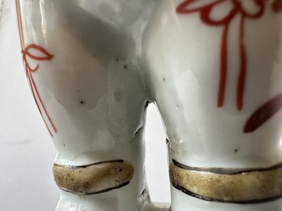 Lot 87 - A PAIR OF CHINESE FAMILLE-VERTE 'BOYS', KANGXI PERIOD (1662-1722)