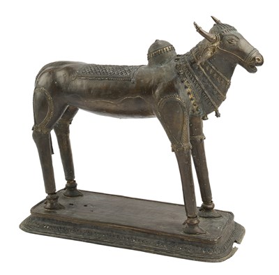 Lot 130 - A LARGE BASTAR BRONZE FIGURE OF NANDI, EASTERN INDIA, 19TH CENTURY