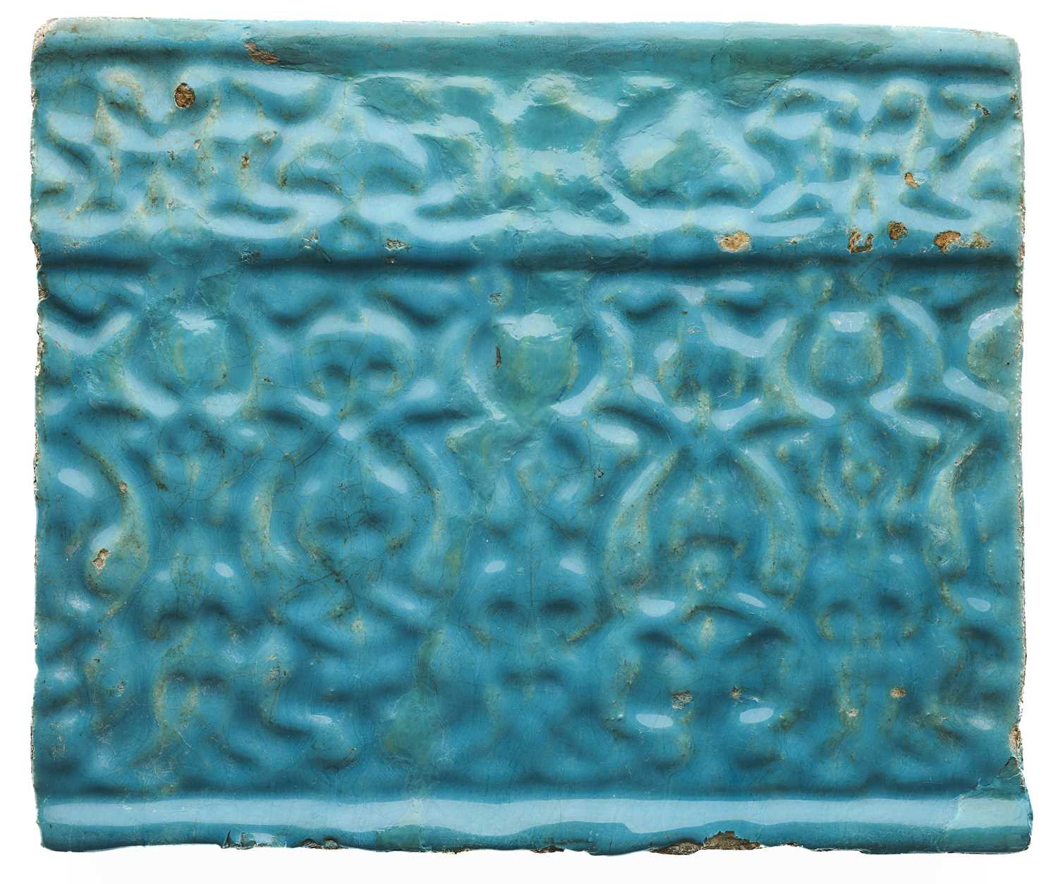 Lot 91 - A KASHAN MOULDED TURQUOISE TILE, PERSIA, CIRCA 13TH CENTURY