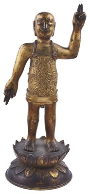 Lot 88 - A GILT BRONZE FIGURE OF THE INFANT BUDDHA