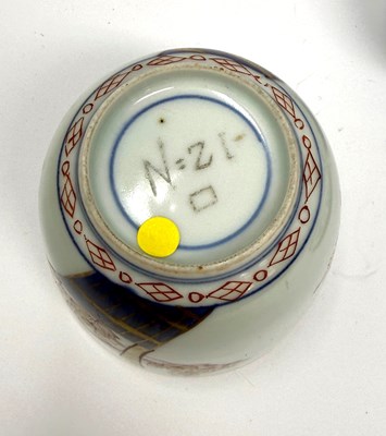 Lot 3 - A CHINESE BLUE AND WHITE TEA BOWL, KANGXI PERIOD (1662-1722) AND AN ARITA BEAKER, CIRCA 1700, BOTH WITH 'JOHANNEUM' INVENTORY NUMBERS