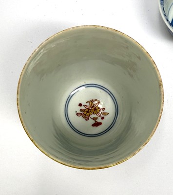Lot 3 - A CHINESE BLUE AND WHITE TEA BOWL, KANGXI PERIOD (1662-1722) AND AN ARITA BEAKER, CIRCA 1700, BOTH WITH 'JOHANNEUM' INVENTORY NUMBERS