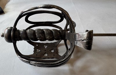 Lot 4 - AN ENGLISH BASKET-HILTED CAVALRY BACKSWORD, MID-18TH CENTURY