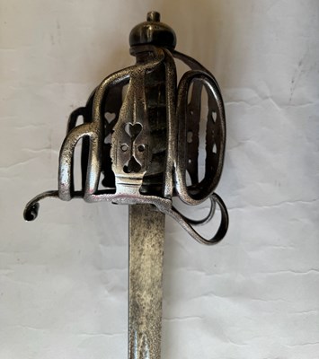 Lot 4 - AN ENGLISH BASKET-HILTED CAVALRY BACKSWORD, MID-18TH CENTURY