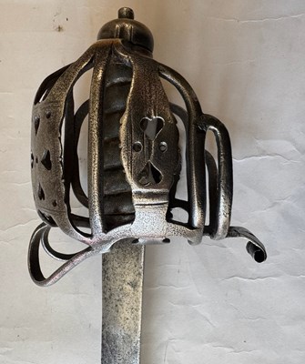 Lot 4 - AN ENGLISH BASKET-HILTED CAVALRY BACKSWORD, MID-18TH CENTURY
