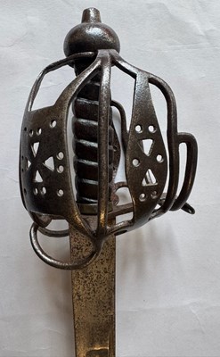 Lot 5 - AN ENGLISH BASKET-HILTED CAVALRY BACKSWORD, MID-18TH CENTURY
