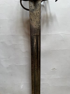 Lot 5 - AN ENGLISH BASKET-HILTED CAVALRY BACKSWORD, MID-18TH CENTURY