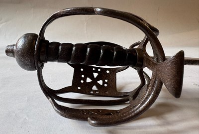 Lot 5 - AN ENGLISH BASKET-HILTED CAVALRY BACKSWORD, MID-18TH CENTURY