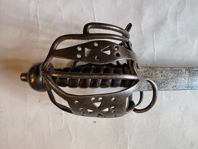 Lot 5 - AN ENGLISH BASKET-HILTED CAVALRY BACKSWORD, MID-18TH CENTURY