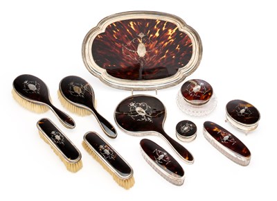 Lot 110 - A GEORGE V SILVER AND TORTOISESHELL DRESSING TABLE SET, GOLDSMITHS & SILVERSMITHS CO. LTD., BIRMINGHAM & LONDON, 1923-28