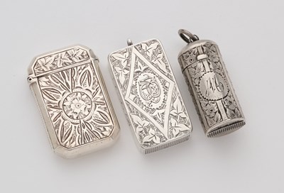 Lot 619 - THREE VICTORIAN SILVER SMALL VESTA CASES, ALL BIRMINGHAM, 1885/86