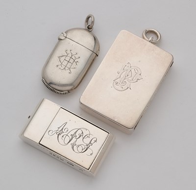 Lot 607 - THREE VICTORIAN SILVER VESTA CASES, 1884/85