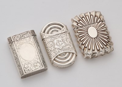 Lot 638 - THREE VICTORIAN SILVER VESTA CASES, 1885/87
