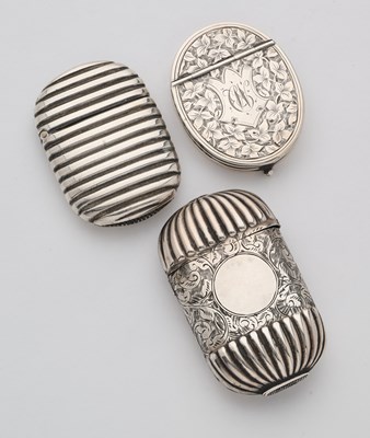 Lot 640 - THREE VICTORIAN SILVER VESTA CASES, 1884-87