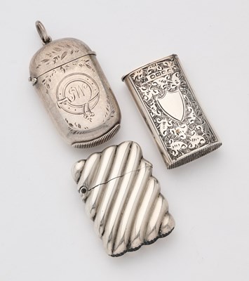 Lot 643 - THREE VICTORIAN SILVER VESTA CASES, ALL BIRMINGHAM, 1884-87