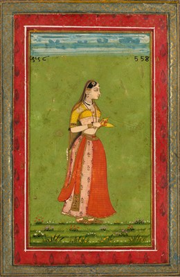 Lot 47 - A STANDING LADY, DECCAN, PROBABLY HYDERABAD, 18TH CENTURY