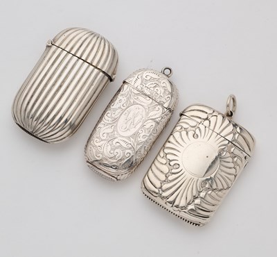 Lot 647 - THREE VICTORIAN SILVER VESTA CASES, 1886/87