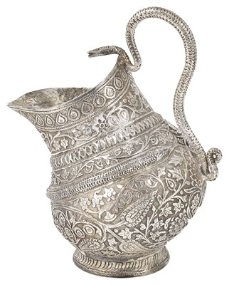 Lot 179 - AN INDIAN SILVER MILK JUG