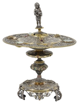 Lot 193 - A FRENCH PARCEL-GILT AND OXIDISED SILVER TAZZA AND COVER