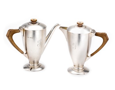 Lot 231 - A PAIR OF GEORGE V SILVER CAFE-AU-LAIT POTS