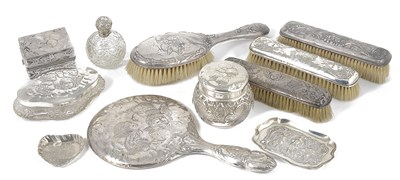 Lot 251 - A COLLECTION OF 'REYNOLD'S ANGEL' STAMPED DRESSING TABLE SILVER