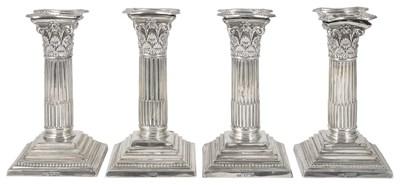 Lot 273 - A SET OF FOUR VICTORIAN SILVER DWARF CANDLESTICKS