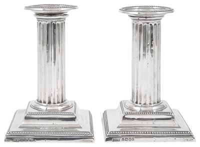 Lot 280 - A PAIR OF VICTORIAN SILVER DWARF CANDLESTICKS