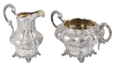 Lot 313 - A VICTORIAN SILVER MILK JUG AND SUGAR BOWL