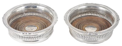 Lot 332 - A PAIR OF GEORGE IV SILVER WINE COASTERS