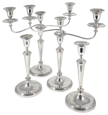 Lot 360 - A SUITE OF GEORGE III SILVER CANDELABRA AND CANDLESTICKS